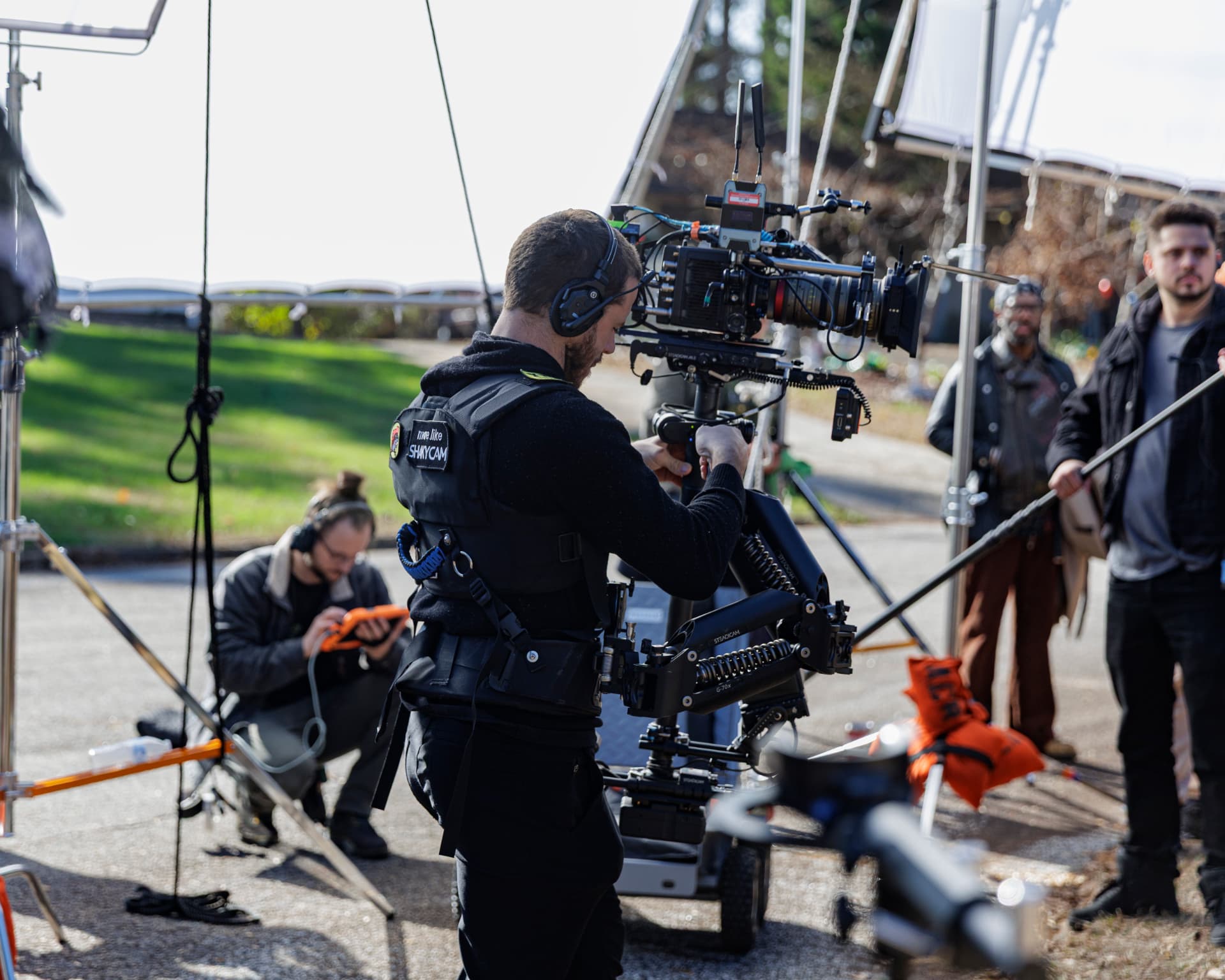 Steadicam operator prepping a shot on location